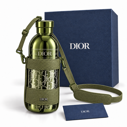 Olive green Dior Aqua bottle set with navy box and blue Dior card on white