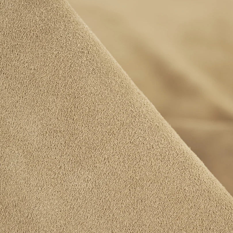 Close-up of beige textured bag material